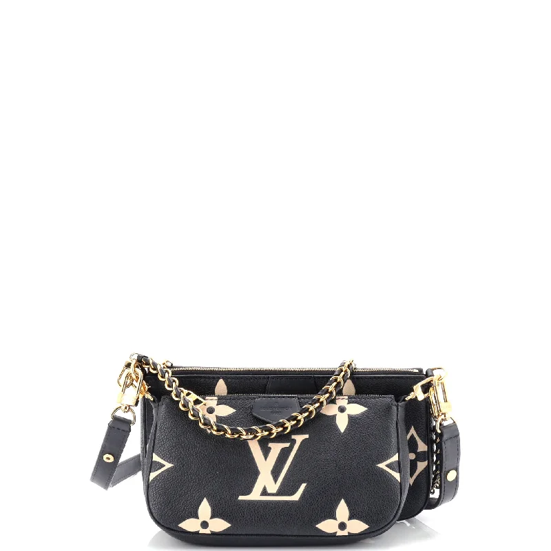 Ladies Louis Vuitton Capucines bags with a detachable shoulder strapMulti Pochette Accessoires Bicolor Monogram Empreinte Giant