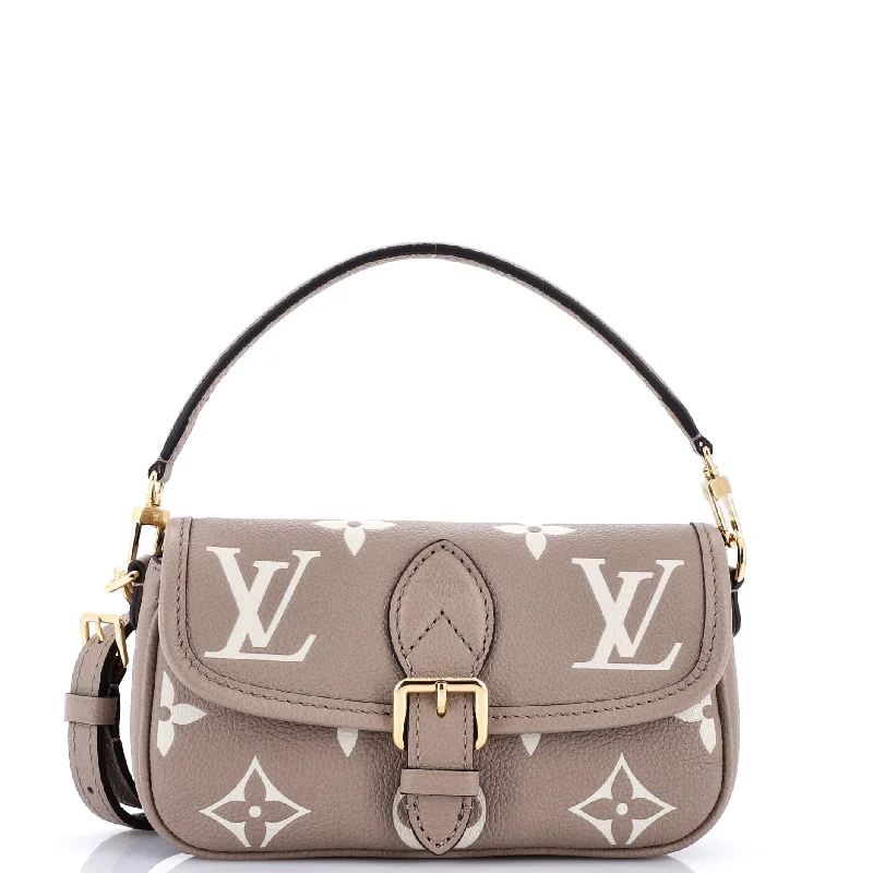 Louis Vuitton Twist bags with a contrast - colored interior for visual interestDiane NM Handbag Bicolor Monogram Empreinte Giant