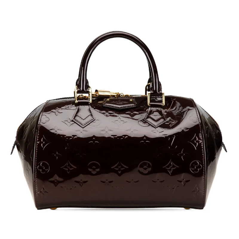 Louis Vuitton Twist bags with a snakeskin - effect panel for a bold lookPurple Louis Vuitton Monogram Vernis Montana Handbag