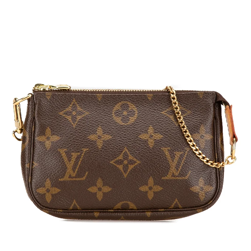 Louis Vuitton Twist bags with a contrast - colored interior for visual interestBrown Louis Vuitton Monogram Mini Pochette Accessoires Handbag