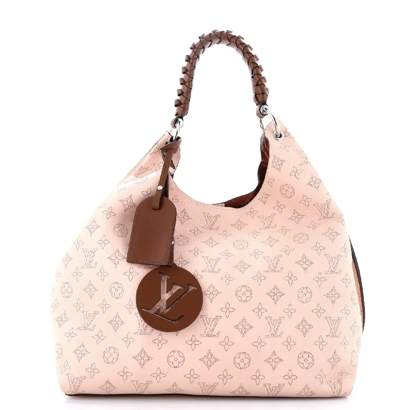 Ladies Louis Vuitton Capucines bags with gold - toned hardwareCarmel Hobo Mahina Leather