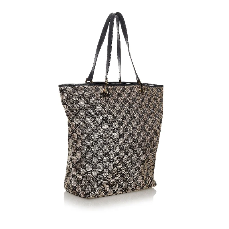 Women Gucci Sylvie bags with a monogram - embossed leatherGucci GG Canvas Tote Bag (33604)