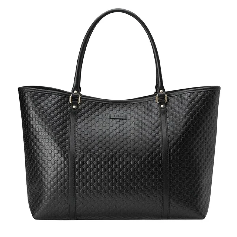 Women Gucci Sylvie bags with a monogram - embossed leatherLeather Micro Guccissima Large Joy Tote