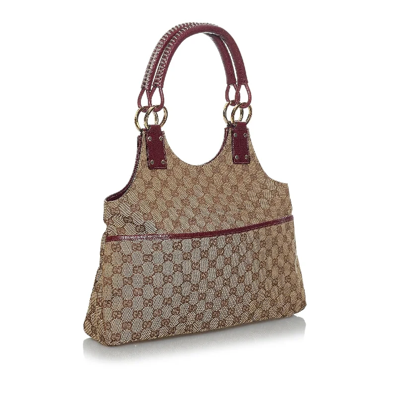 Women Gucci crossbody bags with a woven leather strapGucci GG Canvas Shoulder Bag (35156)