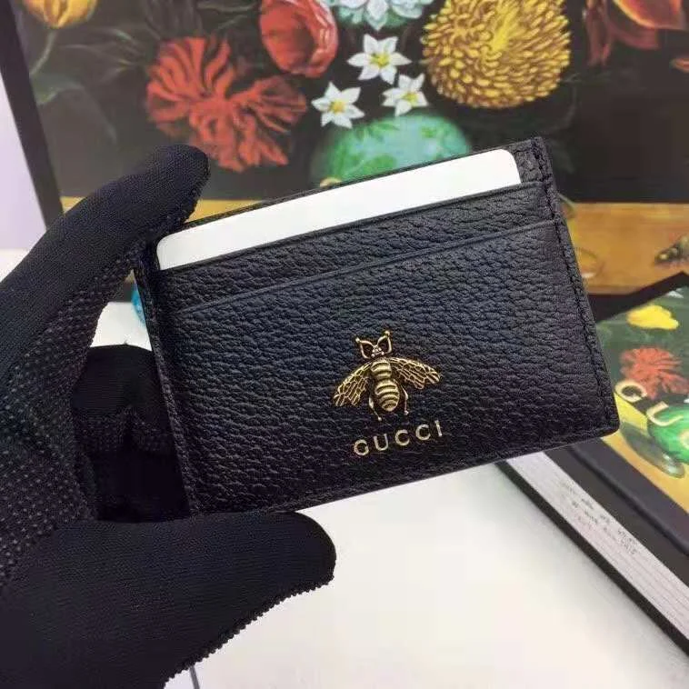 Women Gucci bags with a snap - button closure and a decorative charmBC - GUCCI BAG - 694