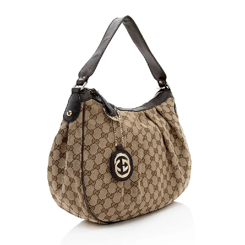 Women Gucci bags with a chain - link trim and a leather bodyGucci GG Canvas Sukey Hobo (18123)