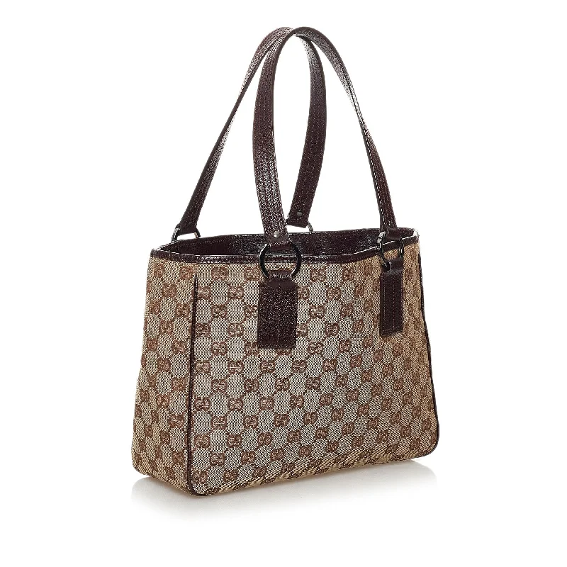 Women Gucci bags with a magnetic snap closure for easy accessGucci GG Canvas Tote Bag (33855)