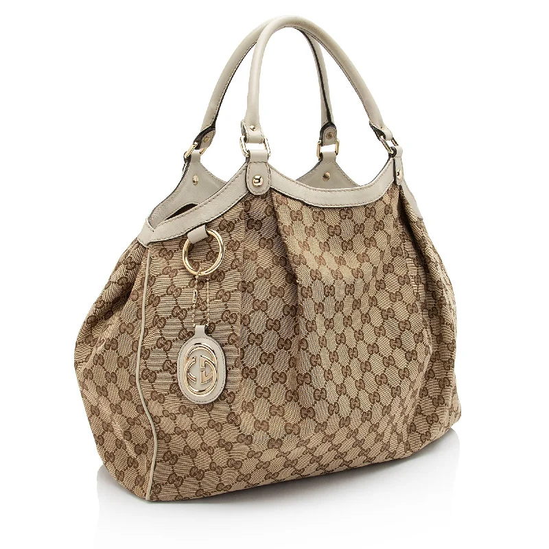 Gucci handbags for women with a patent - leather finishGucci GG Canvas Sukey Large Tote (A7XQdb)