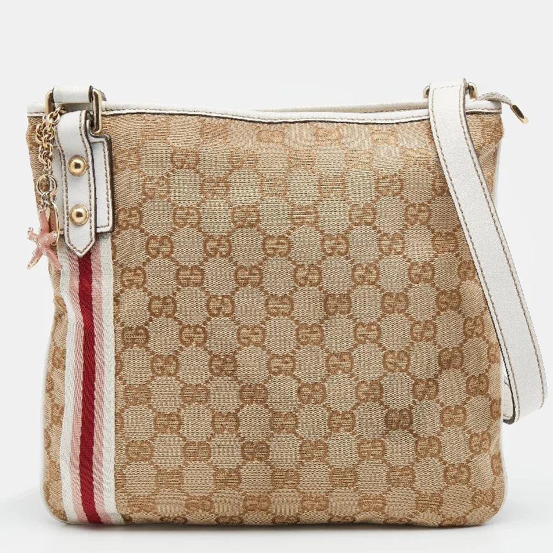 Women Gucci Sylvie bags with a detachable ribbon detailGucci Beige/White GG Canvas And Leather Web Jolicoeur Charms Shoulder Bag