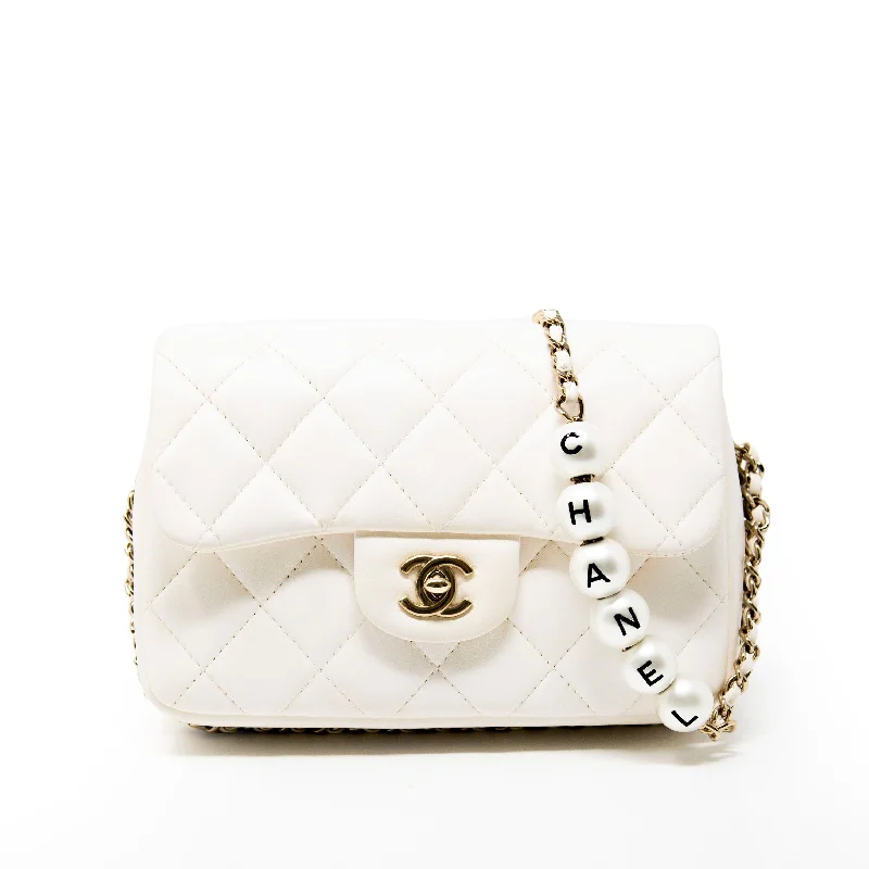 Chanel Limited Edition Handbag for CollectorsChanel White Pearl Logo Mini Flap