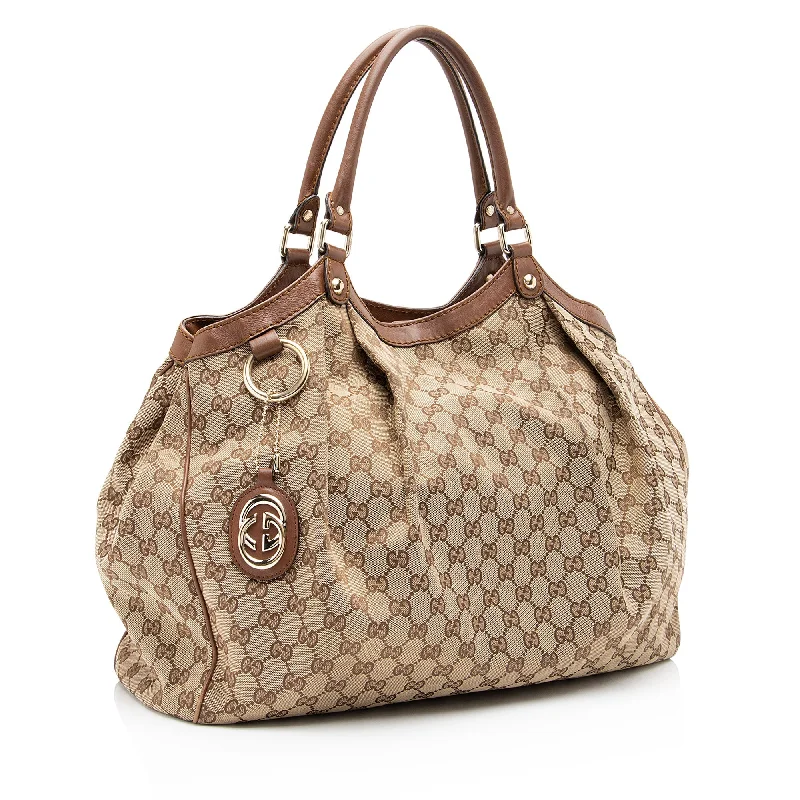 Women Gucci bags with a snap - button closure and a decorative charmGucci GG Canvas Sukey Large Tote (T4JM0Y)