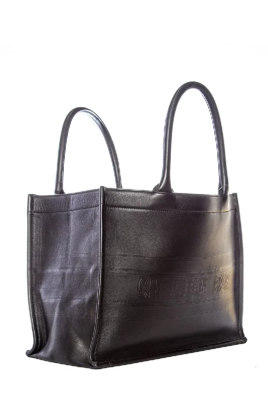 Christian Dior tote bags with a printed Dior logo on the frontChristian Dior Black Leather Embossed Logo Tote