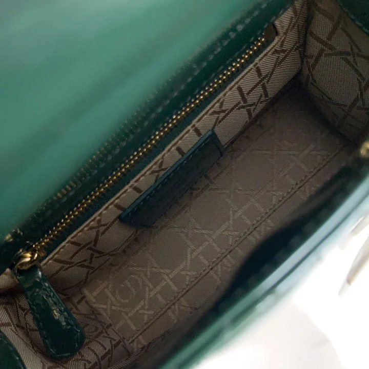 Christian Dior Saddle bags with a distressed leather finishChristian Dior Lady Bag Green