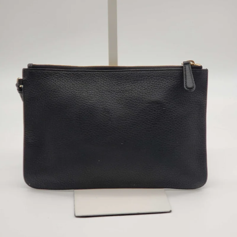 Christian Dior Saddle bags with a patent leather finish for a shiny lookChristian Dior Leather Black Wristlet