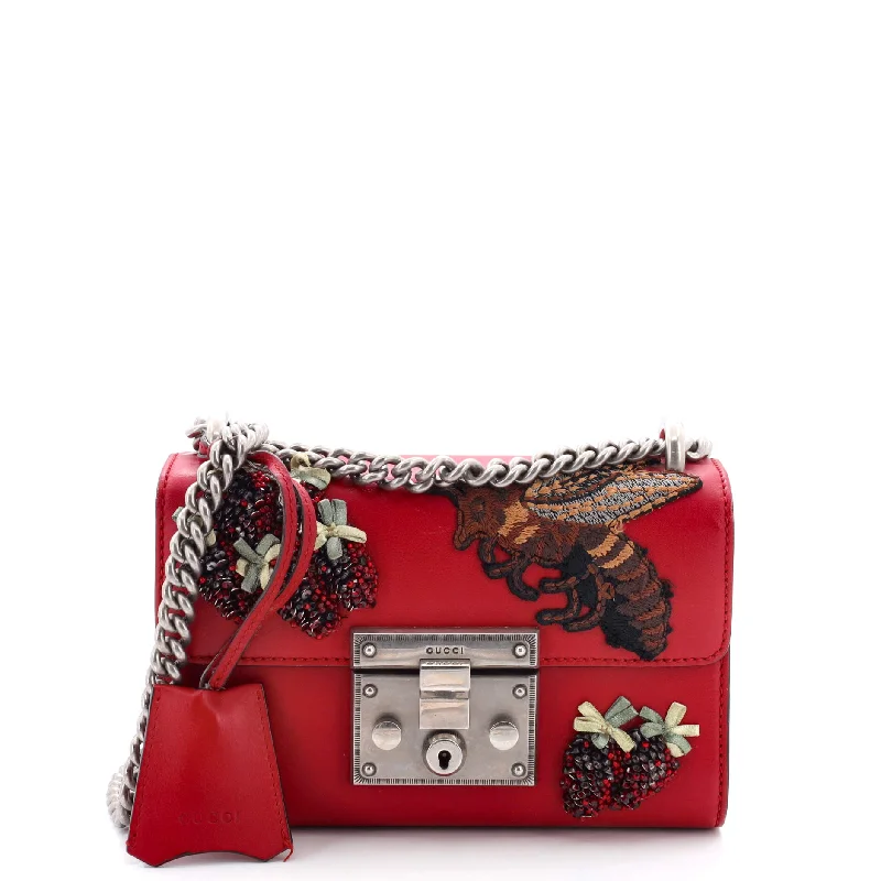 Christian Dior Saddle bags with a studded trim for a bold lookPadlock Shoulder Bag Embellished Leather Small