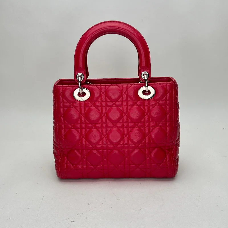 Christian Dior Saddle bags with a studded trim for a bold lookLady Dior Medium Medium Red Top Handle Bag in Lambskin, Silver hardware